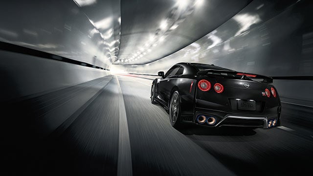 2023 Nissan GT-R seen from behind driving through a tunnel | Crown Nissan in St. Petersburg FL